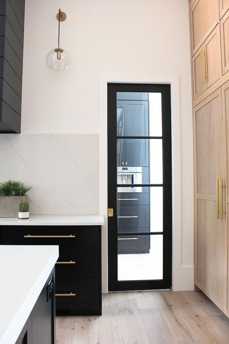 Wooden kitchen door with a textured design