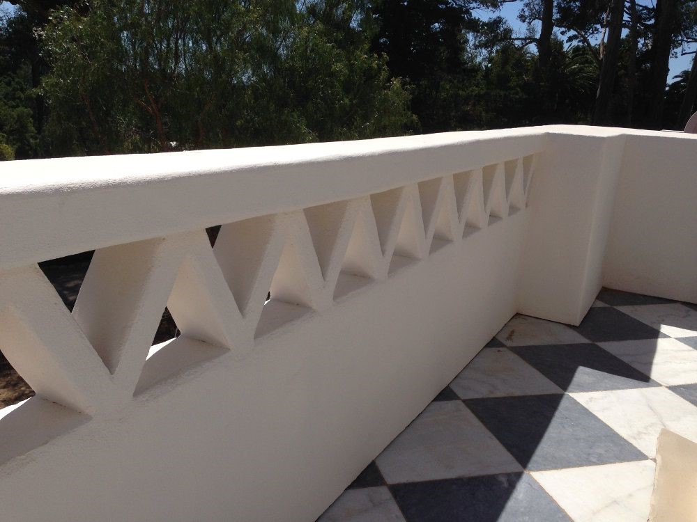 Concrete balcony railings with a decorative finish