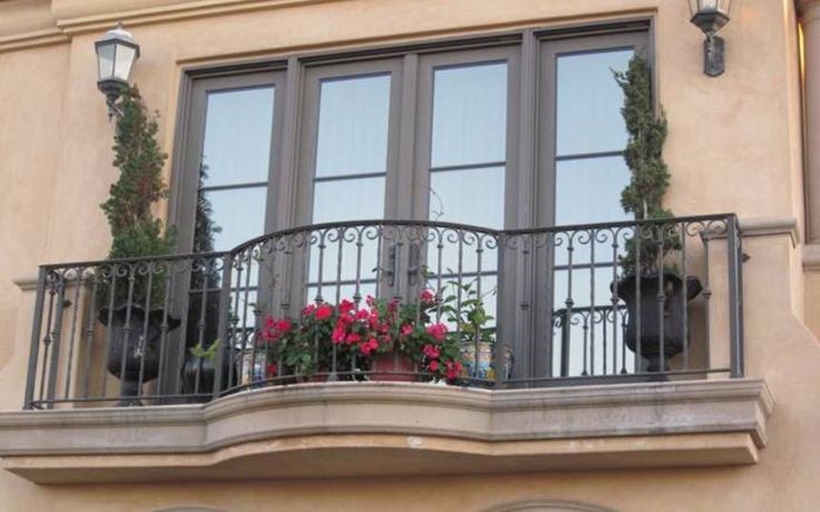 Beautiful flowers draped across the balcony rails