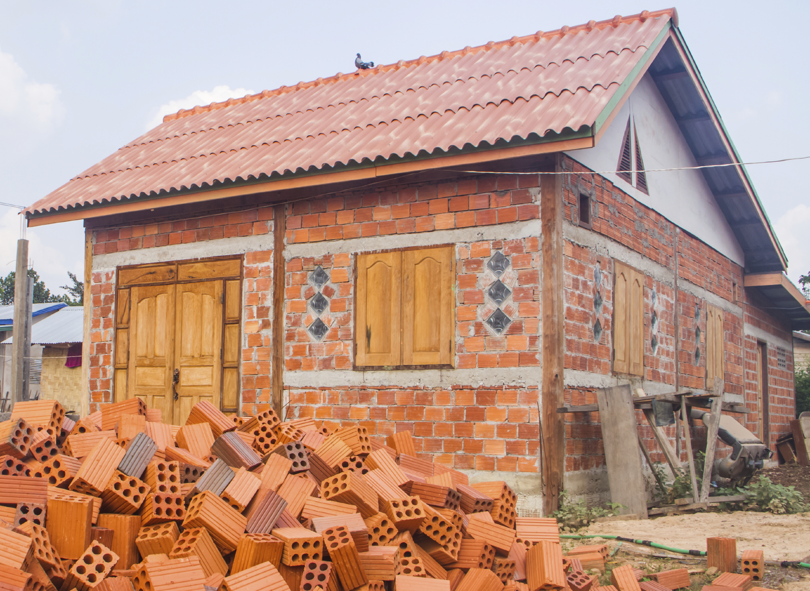 Building house with adobe bricks.