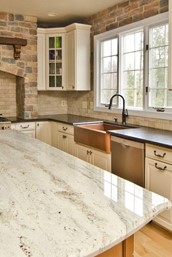 Granite versus quartz kitchen countertops: A buyer’s guide