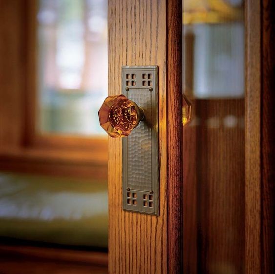 Intricate backplate  main door wooden handle design