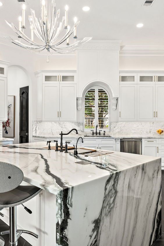 Combining black and white modular kitchen with marble