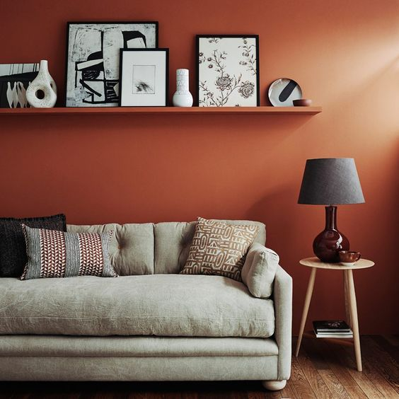 Dull orange wall with black accents