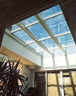 Glass false ceiling encased with a timber frame